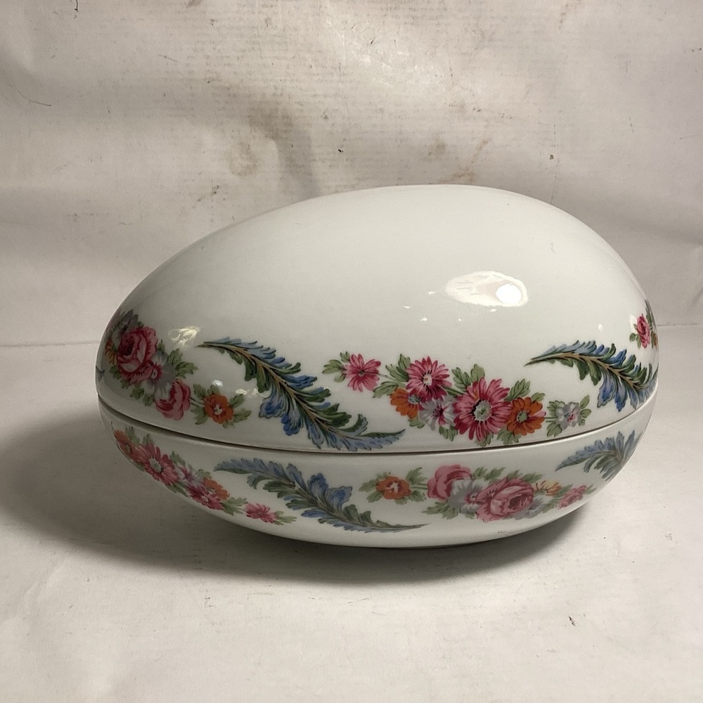Vintage porcelain egg made in Paris, France.